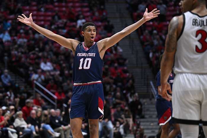 Fresno State Bulldogs forward Orlando Robinson (10) reacts after an offensive goaltending call on the Bulldogs during the second overtime against the San Diego State Aztecs at Viejas Arena.